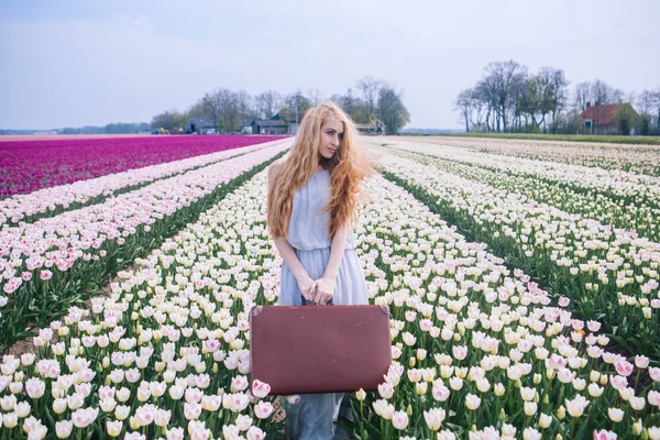 Beautiful young woman with long red hair wearing in white dress — Stock Photo, Image