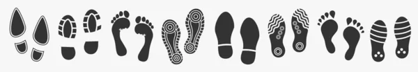 Beyaz üzerine izole edilmiş insan ayak izleri. Vektör — Stok Vektör