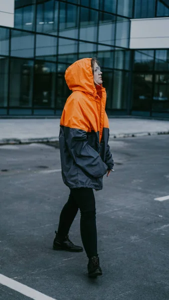 Girl in protective overalls and glasses. Air pollution and hazard concept — ストック写真