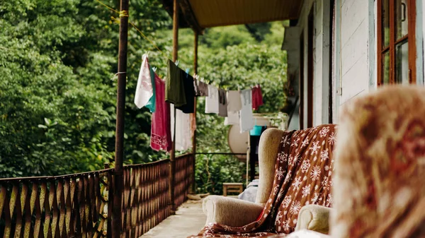 Clothes drying on rope line on a balcony - rural life — 스톡 사진