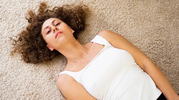 Woman Lying Down on Carpet, Happy Young Adult Girl Lie on Floor