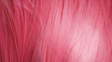 Pembe saç yakın çekim dokusu. Arkaplan olarak kullanılabilir
