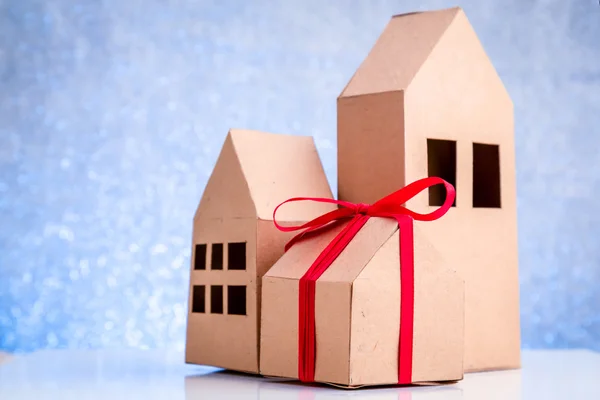 House in brown recycled paper on white floor — Stock Photo, Image