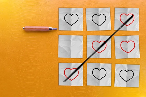 Basit bir oyun - kalp ile X-O oyun şekil çizim — Stok fotoğraf