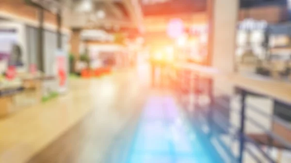 Blurred image of people walking at shopping mall — Stock Photo, Image