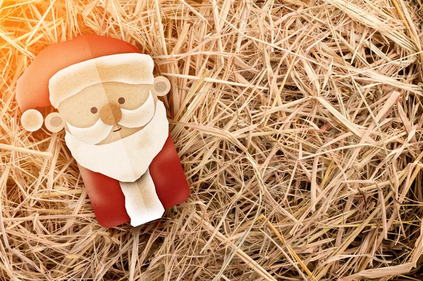 圣诞老人剪纸风格上干草背景 — 图库照片