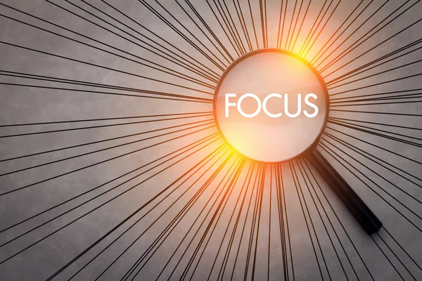 focus concept with magnifying glass