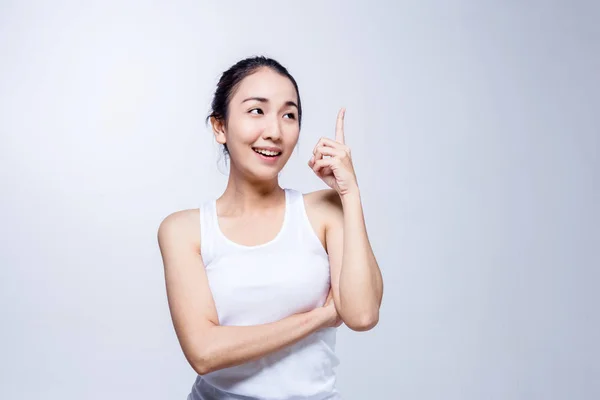 Retrato Uma Beleza Asiática Sorridente Menina Apontando Dedo Para Cima — Fotografia de Stock