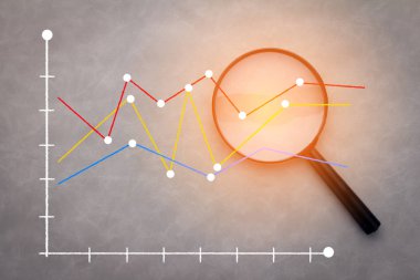 magnifying graph chart analysis business concept