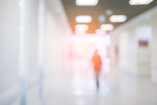 abstract blur image background of clinic hospital walkway corridor