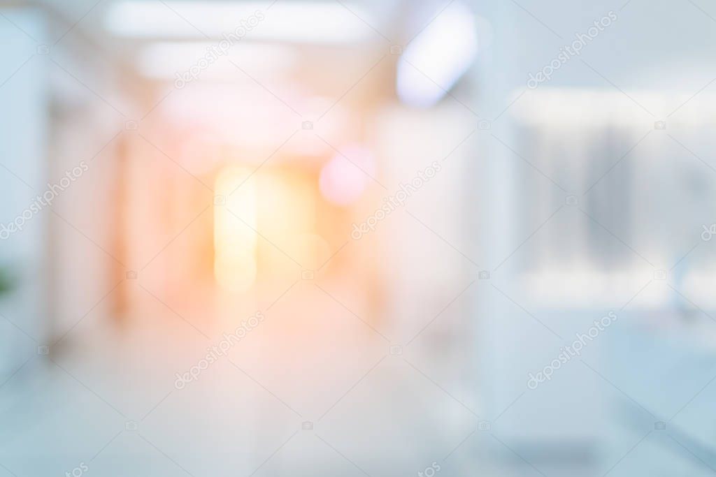 abstract blur defocus background of mall department store with walkway and people shopping