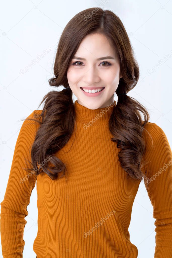 portrait beauty asian woman brown dress smile with happy confident and joyful white background