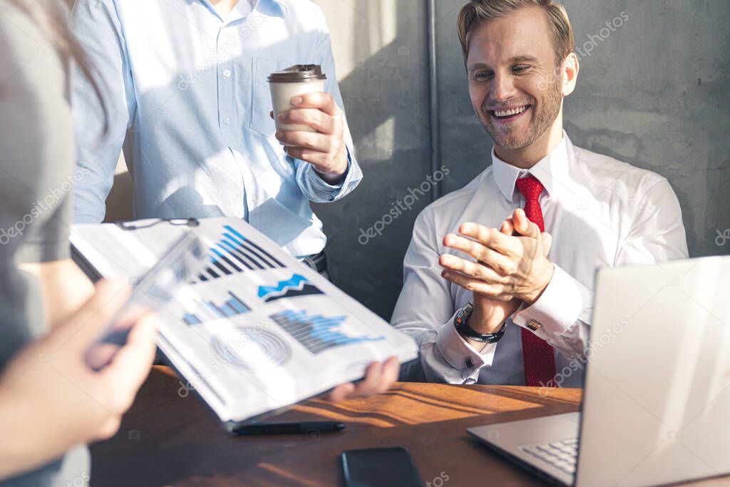 successful business meeting caucasian businessman manager white shirt red tie enjoy with result of profit from chart graph with co worker office background