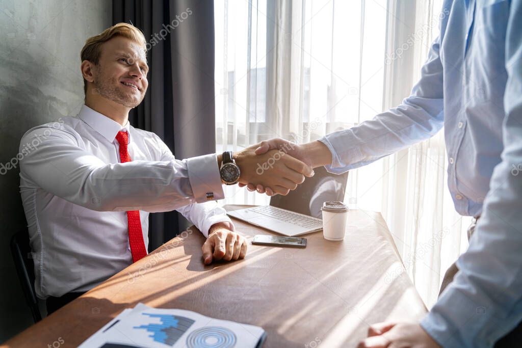 successful business meeting caucasian businessman manager white shirt red tie enjoy with result of profit from chart graph with co worker office background