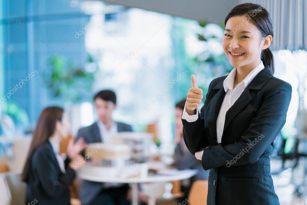 portrait close up smart attractive asian business female smile with confident and leadership in modern office background