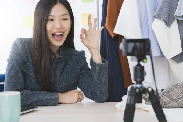 asian beautiful asian  vloger or bloger present cloth dress online business shop online ideas concept