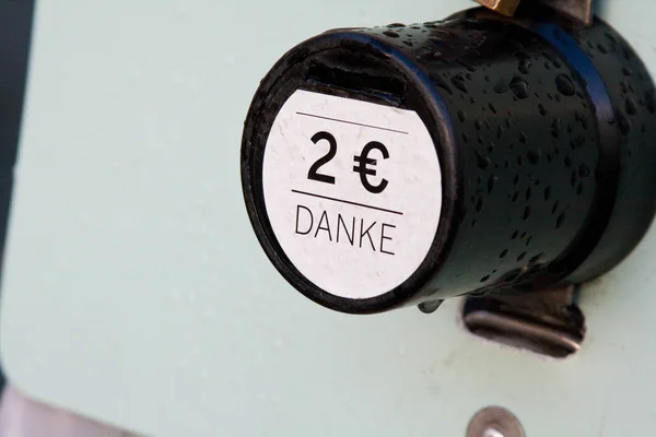 Price of 2 Euro and German word meaning 