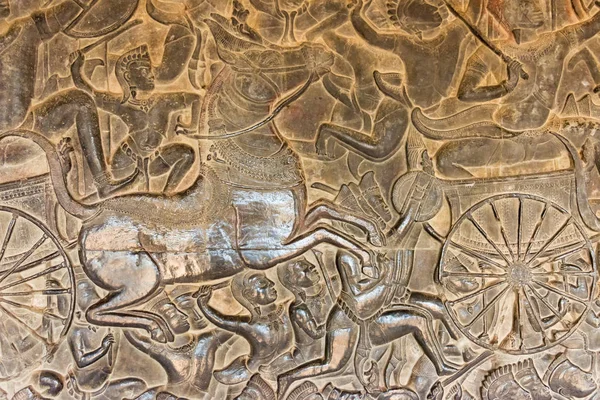 Siem Reap, Camboja - 5 de fevereiro de 2015: Relief at Angkor Wat. um local histórico famoso (Património Mundial da UNESCO) em Angkor, Siem Reap, Camboja . — Fotografia de Stock