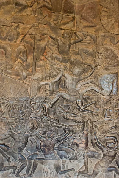 シェムリ アップ, カンボジア - 2015 年 2 月 5 日: アンコール ワットのレリーフ。アンコールは、シェムリ アップ、カンボジアで有名な史跡 (ユネスコ世界遺産). — ストック写真