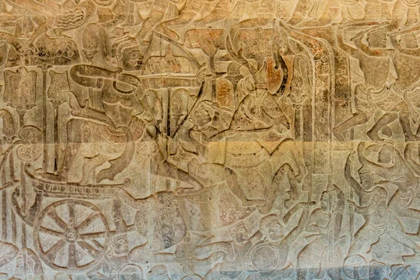 Siem Reap, Camboja - 5 de fevereiro de 2015: Relief at Angkor Wat. um local histórico famoso (Património Mundial da UNESCO) em Angkor, Siem Reap, Camboja . — Fotografia de Stock