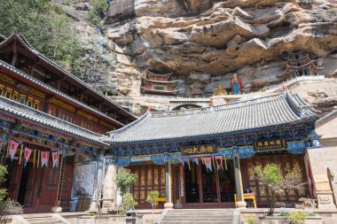 Yunnan, Çin - Mar 21 2015: Baoxiang Tapınağı'nda Shibaoshan Mountain(Shibaoshan Shiku). ünlü bir ören Jianchuan, Yunnan, Çin.