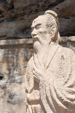 Yunnan, Çin - Mar 21 2015: Xu Xiake heykeller, Shibaoshan Mountain(Shibaoshan Shiku). Xu Xiake(1587-1641) olduğu bir ünlü Explorer ve coğrafyacı Jianchuan, Yunnan, Çin.