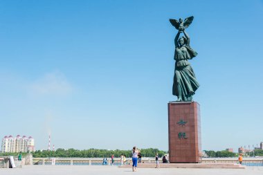 HEILONGJIANG, CHINA - Jul 15 2015: Heilongjiang Park. The City of Heihe is a major border crossing between China and Blagoveshchensk of Russia. clipart
