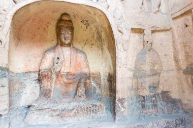 Shanxi, Çin - 17 Eylül 2015: Budda heykeller, Yungang mağarasını (Unesco Dünya Mirası Sit Alanı). ünlü tarihi bir site: Datog, Shanxi, China.