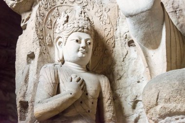 Shanxi, Çin - 17 Eylül 2015: Budda heykeller, Yungang mağarasını (Unesco Dünya Mirası Sit Alanı). ünlü tarihi bir site: Datog, Shanxi, China.