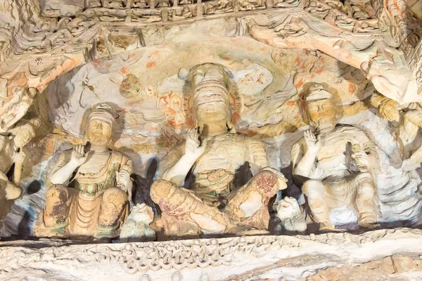 SHANXI, CHINA - 17 de septiembre de 2015: Estatuas de Budda en las Grutas de Yungang (Patrimonio de la Humanidad por la UNESCO). un sitio histórico famoso en Datog, Shanxi, China . —  Fotos de Stock