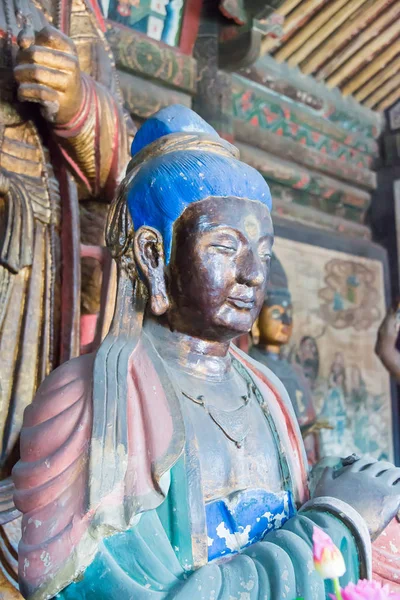 SHANXI, CHINA - 17 de septiembre de 2015: Estatua de Budda en el Templo de Guanyintang. un sitio histórico famoso en Datog, Shanxi, China . — Foto de Stock