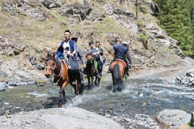 Doğu Türkistan, Çin - 10 Mayıs 2015: Nanshan mera, ziyaretçi. Urumçi, Xinjiang, China ünlü bir manzarada.