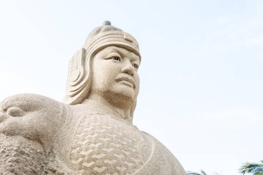 FUJIAN, CHINA - Dec 31 2015: Zheng Chenggong Statue at The Zheng Chenggong Memorial Hall. a famous historic site in Quanzhou, Fujian, China. clipart