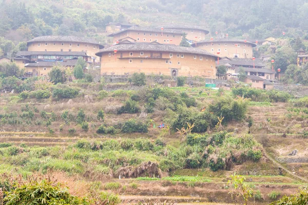 Fujian, china - 03. Januar 2016: tianluokeng tulou cluster at tianloukeng tulou malerische spots in fujian tulou (nanjing) landschaftlich reizvolles gebiet (UNESCO-Welterbe). ein berühmter historischer ort in nanjing, fujian, china. — Stockfoto