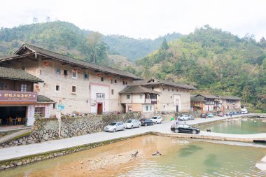 Fujian, Çin - 02 Ocak 2016: Taxia köyde Tianloukeng Tulou doğal noktalar Fujian Tulou(Nanjing) manzara alanı (Unesco Dünya Mirası). ünlü tarihi bir site Nanjing, Fujian, Çin.