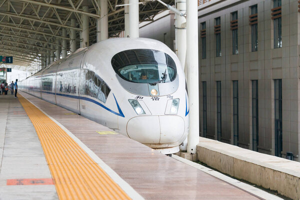 LIAONING, CHINA -  Aug 02 2015: China Railways CRH380BG electric High-Speed Train in Tieling West Railway Station, Tieling, Liaoning, China. CRH380BG used on the China High-Speed Railway network.