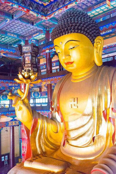 LIAONING, CHINA - Aug 03 2015: Budda statue at Guangyou Temple Scenic Area. a famous historic site in Liaoyang, Liaoning, China.