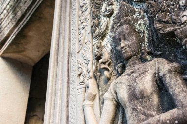 Siem Reap, Kamboçya - 08 Aralık 2016: Kabartma Angkor Thom Bayon tapınağında. bir ünlü Ören (Unesco Dünya Mirası) Angkor, Siem Reap, Kamboçya.