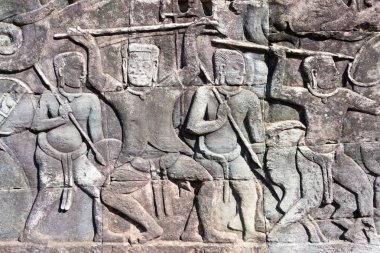 Siem Reap, Kamboçya - 08 Aralık 2016: Kabartma Angkor Thom Bayon tapınağında. bir ünlü Ören (Unesco Dünya Mirası) Angkor, Siem Reap, Kamboçya.