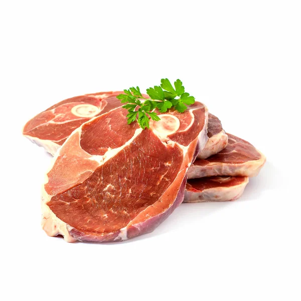 Quattro fette di agnello con erbe aromatiche — Foto Stock