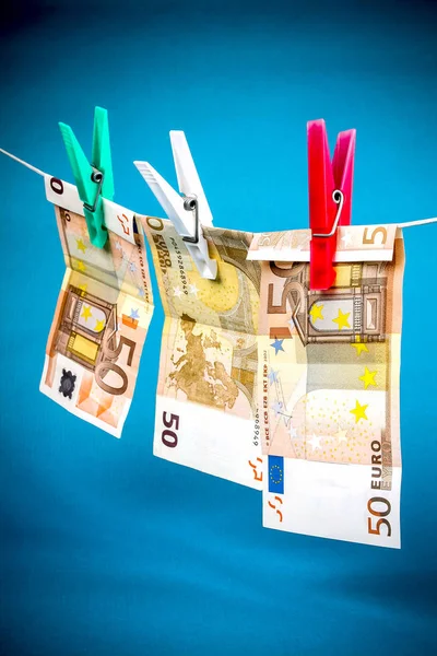 Money laundering from fifty euro notes — Stock Photo, Image