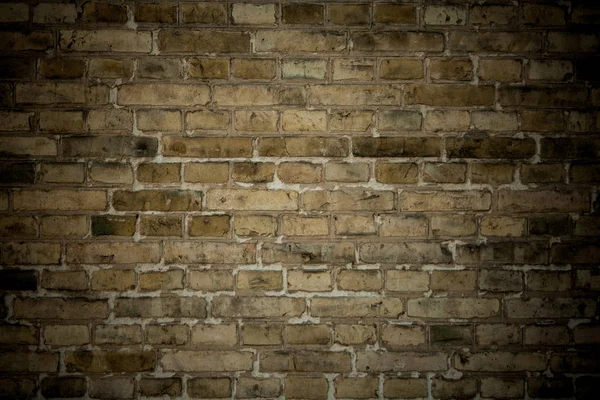 Eski taş duvar arka plan olarak tuğla. — Stok fotoğraf