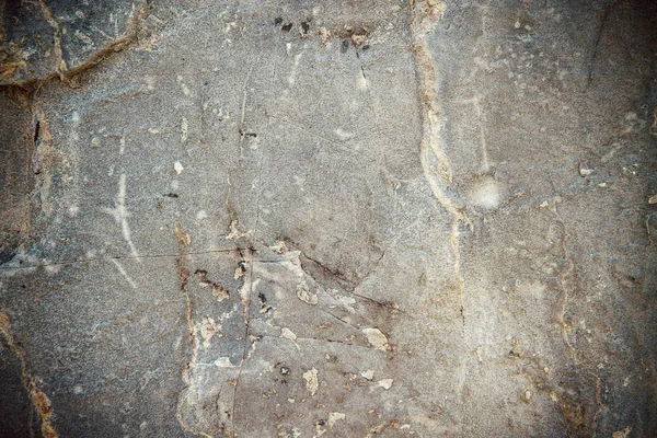 Schmutzige, zerkratzte alte Steinmauer — Stockfoto