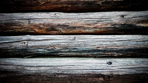 The wall of round, old logs — Stock Photo, Image