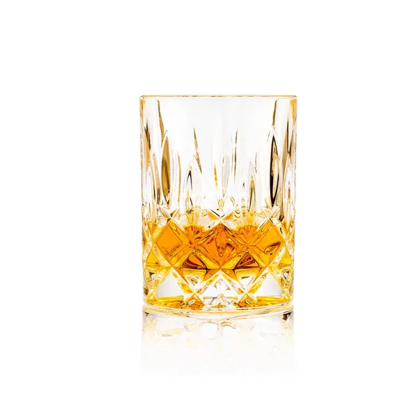 Tumbler glass with golden whiskey — Stock Photo, Image