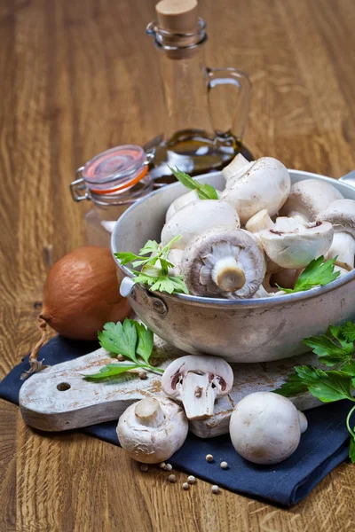 Fresh champignon mushrooms on wooden — Stock Photo, Image