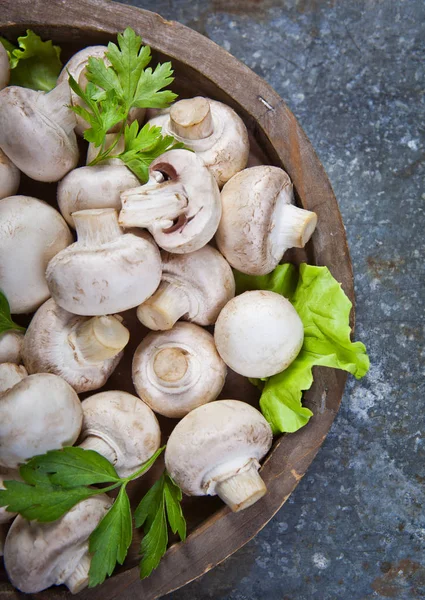 Fresh champignon mushrooms on wooden — Stock Photo, Image