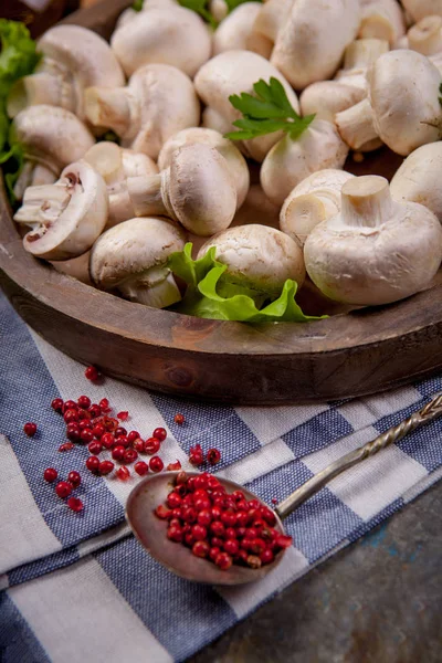 Fresh champignon mushrooms on wooden — Stock Photo, Image