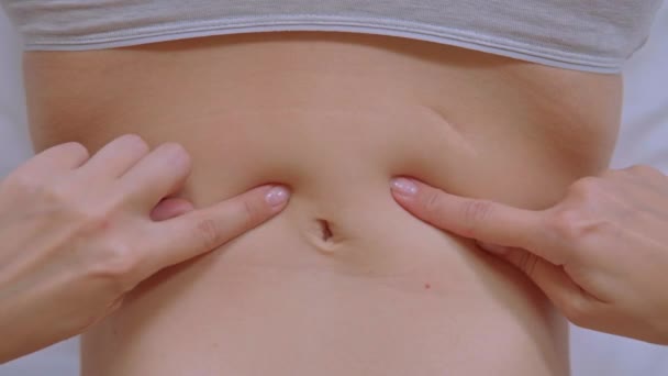 Top view woman touch her belly — стоковое видео