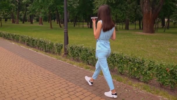 Slim woman has coffee break outdoors summer season — Stock Video